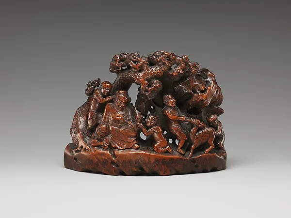 Late seventeenth to early eighteenth century bamboo carving of Zhong Kui with demons